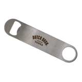 Metal bottle opener with 'Dutch Barn Vodka' branding on a white background
